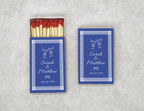 Personalized royal blue lace wedding matchboxes with cocktail martini design - front view