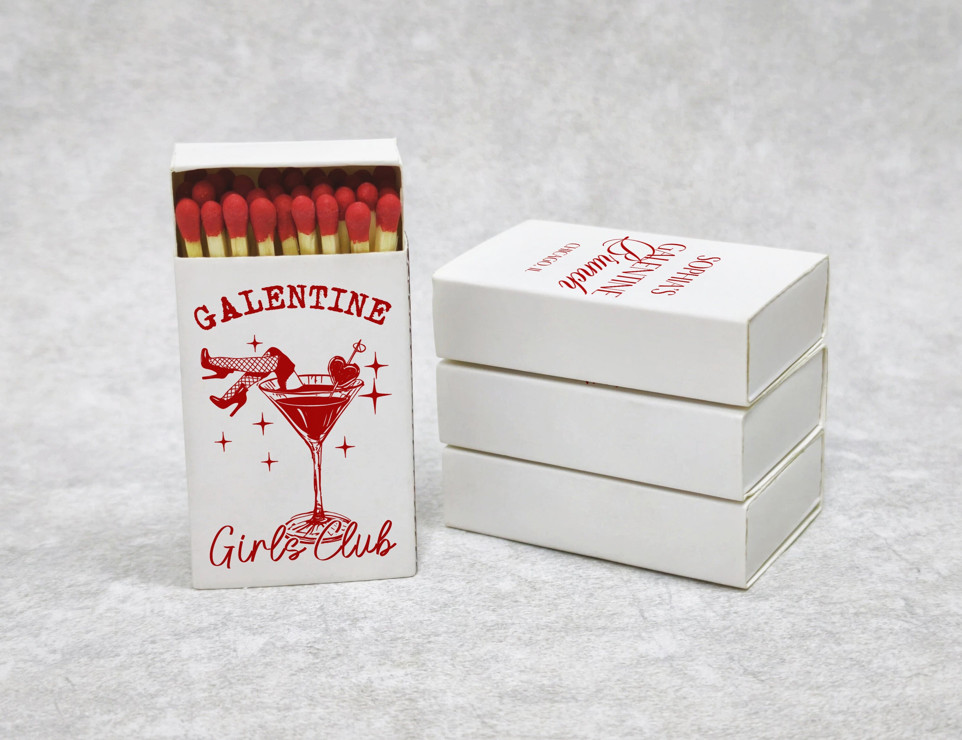 Girls Club matchboxes side view with custom name and location