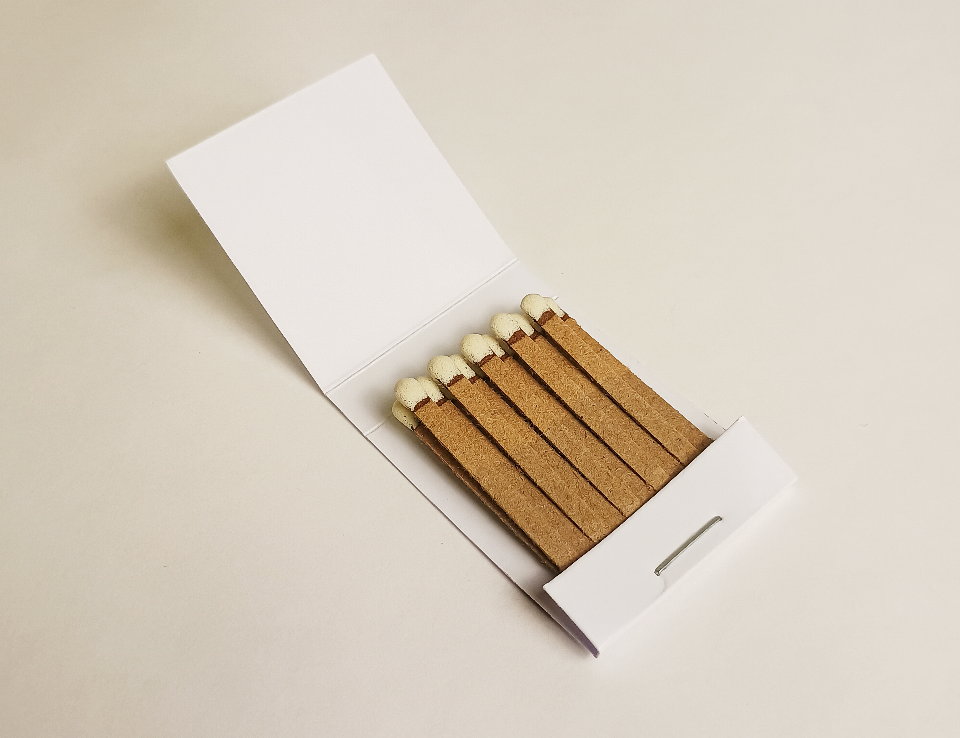 Three-sided matchbook side view showing all printable areas